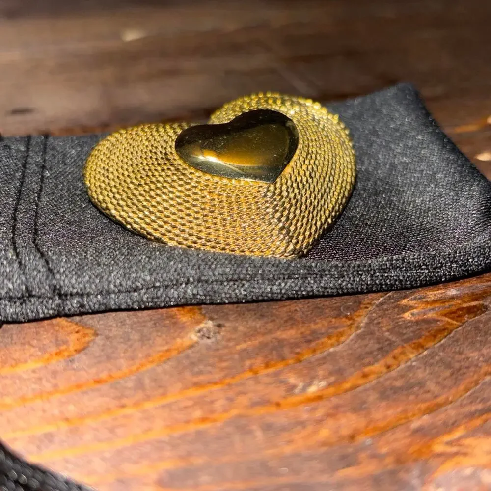 New gold heart brooch with textured surface